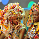The women of Ilê Aiyê blocking group compete in a beauty contest in which they created elaborate head wraps. (Wikimedia Commons)